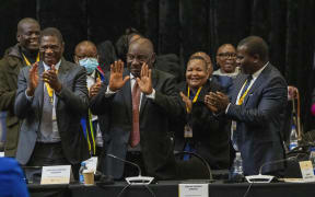 South African président Cyril Ramaphosa reacts after being reelected as leader of the country in Cape Town, South Africa, Friday, June 14, 2024. (AP Photo/Jerome Delay)