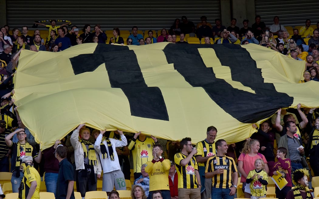 A banner with 10 years is lifted by the fans during the A-League - Wellington Phoenix v Melbourne FC football match at Westpac Stadium in Wellington on Friday the 26 February 2016.