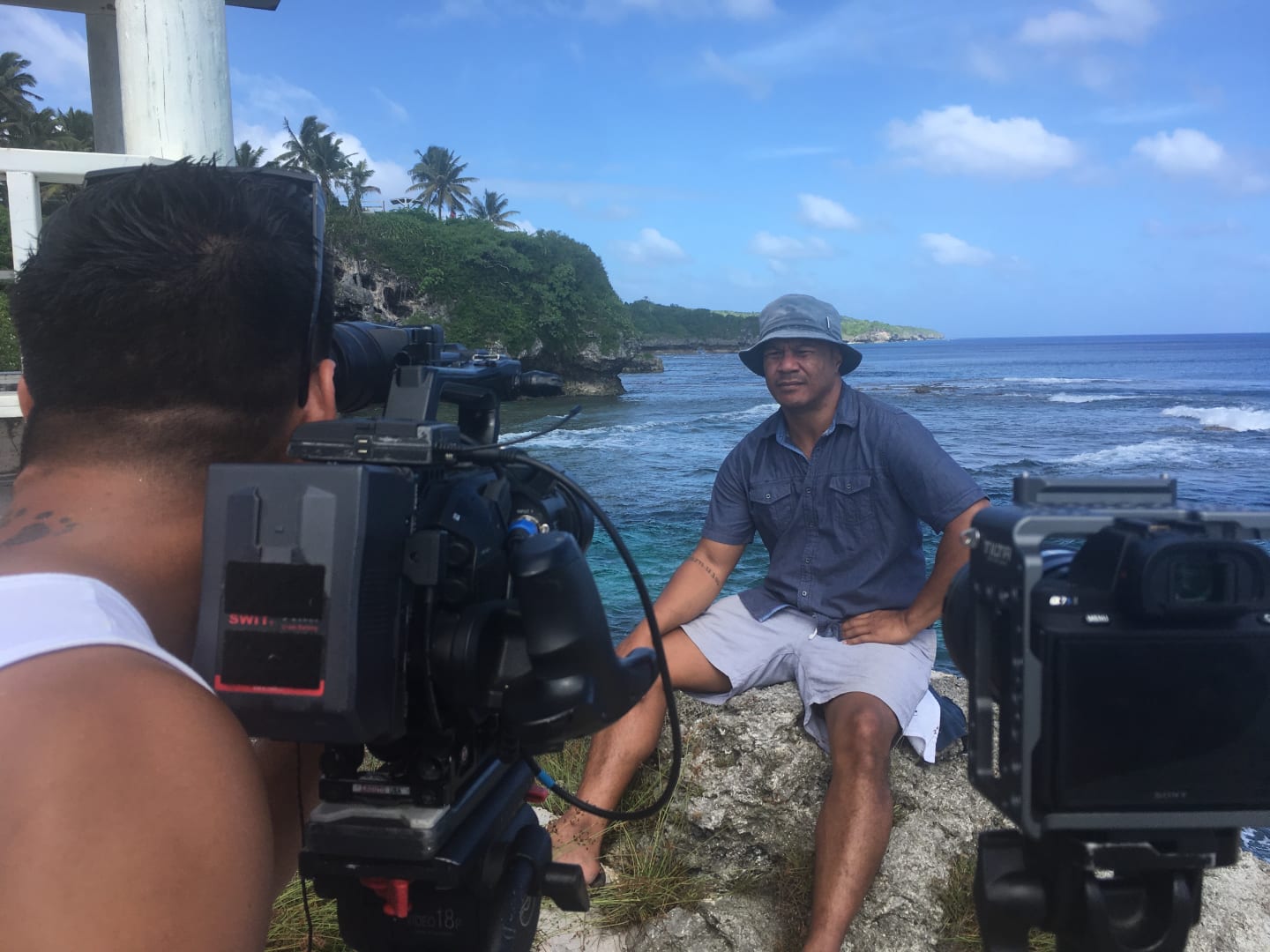 DOP Jack Tarrant, BTS shot of Shimpal Lelisi presenting to camera