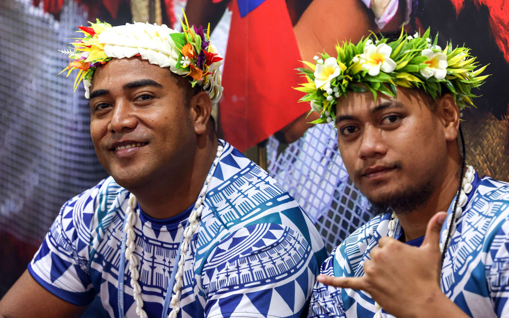 Attendees from Tuvalu pose for a photo during the COP27 climate conference in Egypt