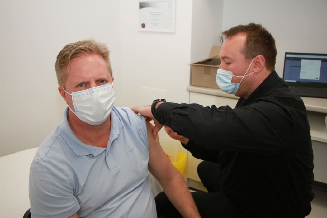 Rotorua MP Todd McClay receiving a Covid-19 vaccine.