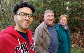 Amir Taghina with Wayne and Linda Taylor.