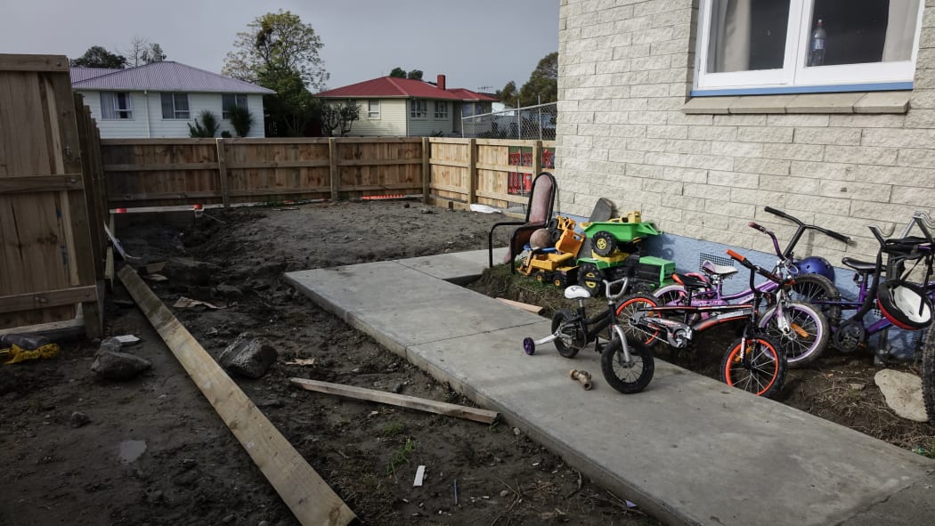 Camille says her back yard has been transformed into mud due to a new build under construction.