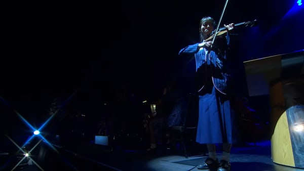 St Andrew's College student Miu Kim plays the violin solo.
