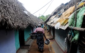 Tamil refugees take shelter at a refugee camp at Gummidipoondi near Chennai (Tamil Nadu) on Thursday, May 21, 2009.