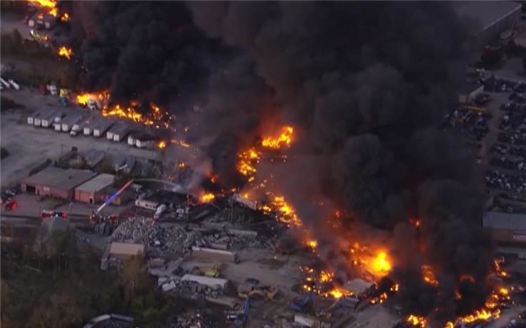 A screenshot form a video showing a fire caused by a plane crash in Lousiville, Kentucky on 4 November 2025.