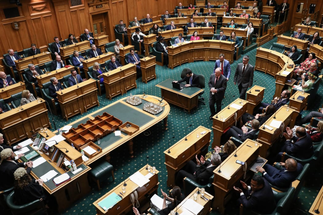 Trevor Mallard is escorted to the Chair by two whips after his election as Speaker
