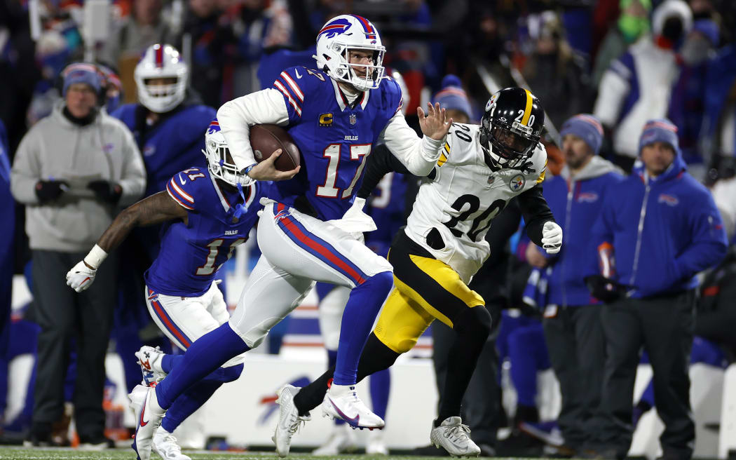 Josh Allen #17 of the Buffalo Bills scores a 52-yard touchdown against the Pittsburgh Steelers during the second quarter at Highmark Stadium.