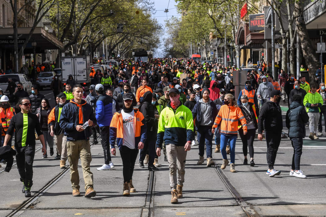 Construction workers and demonstrators attend a protest against Covid-19 regulations in Melbourne on September 21, 2021.