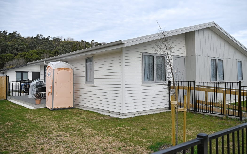 A portaloo is seen outside a newly-built Kāinga Ora home in Gisborne after construction debris was discovered in wastewater pipes.