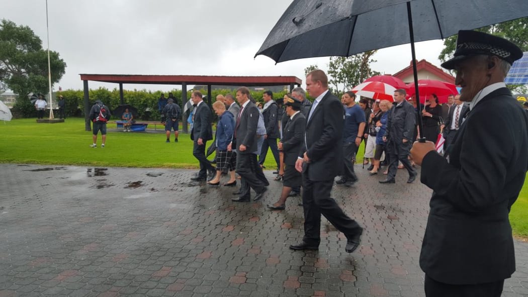 Labour leader Andrew Little leads the delegation onto the marae at Waitangi.