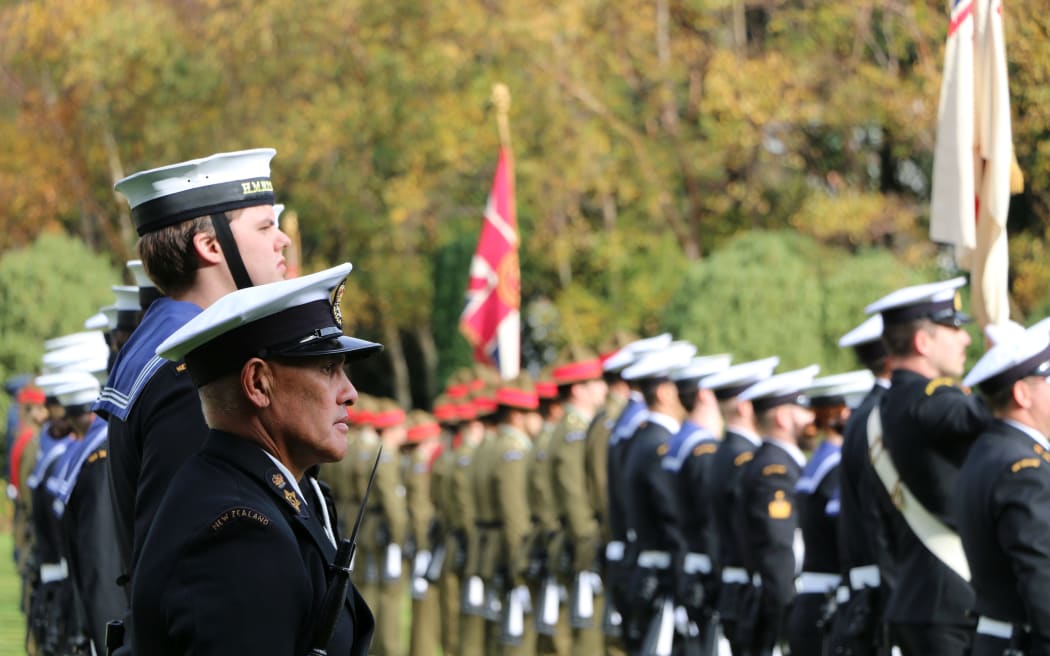 A guard of honour made up of New Zealand army, navy and police.