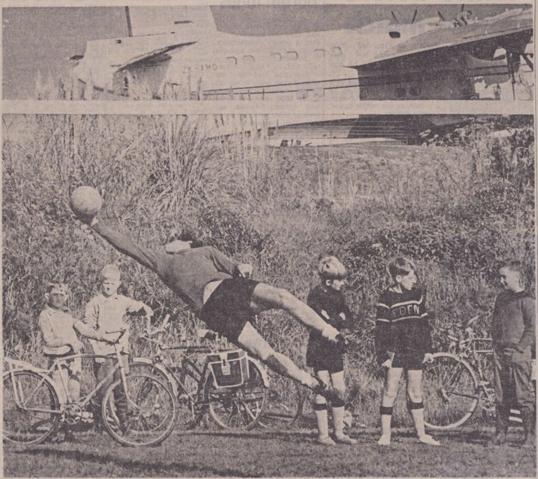 Manchester United goalie Alex Stepney is airborne as he saves a goal during training.