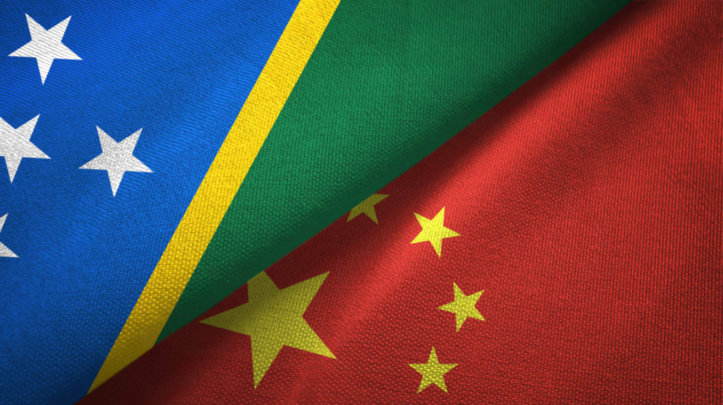 Solomon Islands and China flags together