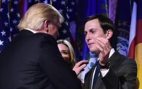 This file photo taken on November 9, 2016 shows President-elect Donald Trump with son-in-law Jared Kushner (R) during an election night party at a hotel in New York.