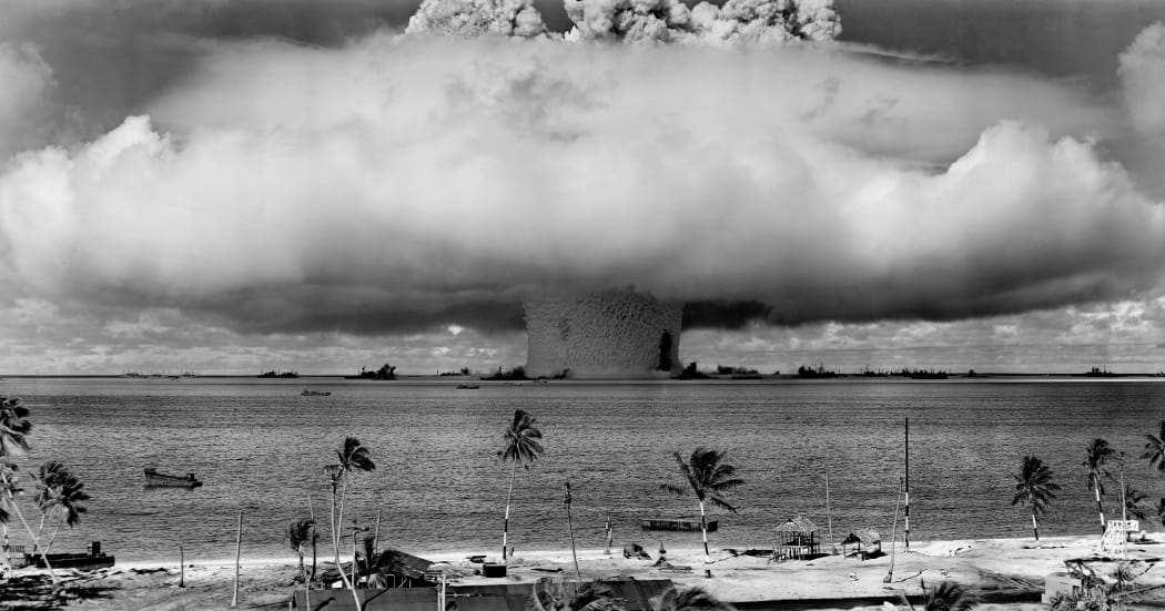 Mushroom-shaped cloud and water column from the underwater nuclear explosion of July 25, 1946, which was part of Operation Crossroads.
