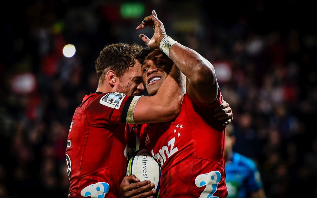 Israel Dagg of the Crusaders celebrates with Seta Tamanivalu.