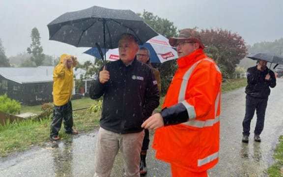 Emergency Management Minister Mark Mitchell with council rivers manager Andy White at the Spring Creek stopbank on 12 April 2024.