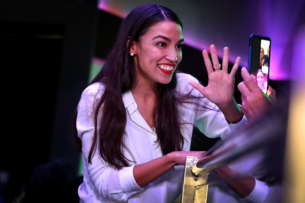 Alexandria Ocasio-Cortez celebrates her victory at La Boom night club in Queen.