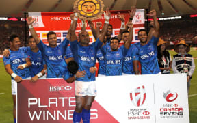 Samoa celebrate winning the Plate title in Vancouver.