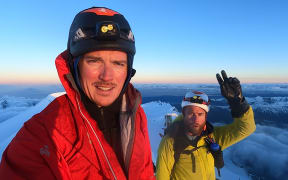 Alastair McDowell and Hamish Fleming on the summit of the Minarets, one of the 3000m peaks, looking out to the west coast over the Tasman Sea.
