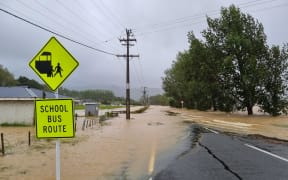 Flooded roads in Kaipara District, Northland.