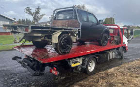 The freshly painted ute police believe was involved in one police car being rammed into in Hamilton.