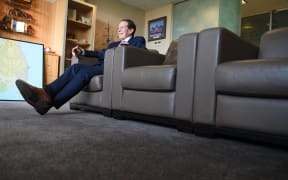 Invercargill Mayor Sir Tim Shadbolt reclining in his mayoral office in 2020.