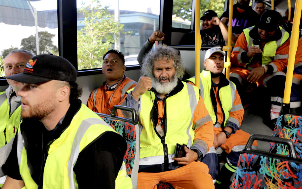 Port of Auckland workers on the bus back to work after demonstrating outside Auckland Town Hall in opposition of mayor's plan to see the port's land.