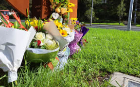 Flowers outside Whangārei Boys' High School in tribute to the student who died on Tuesday on a school trip to Abbey Caves.