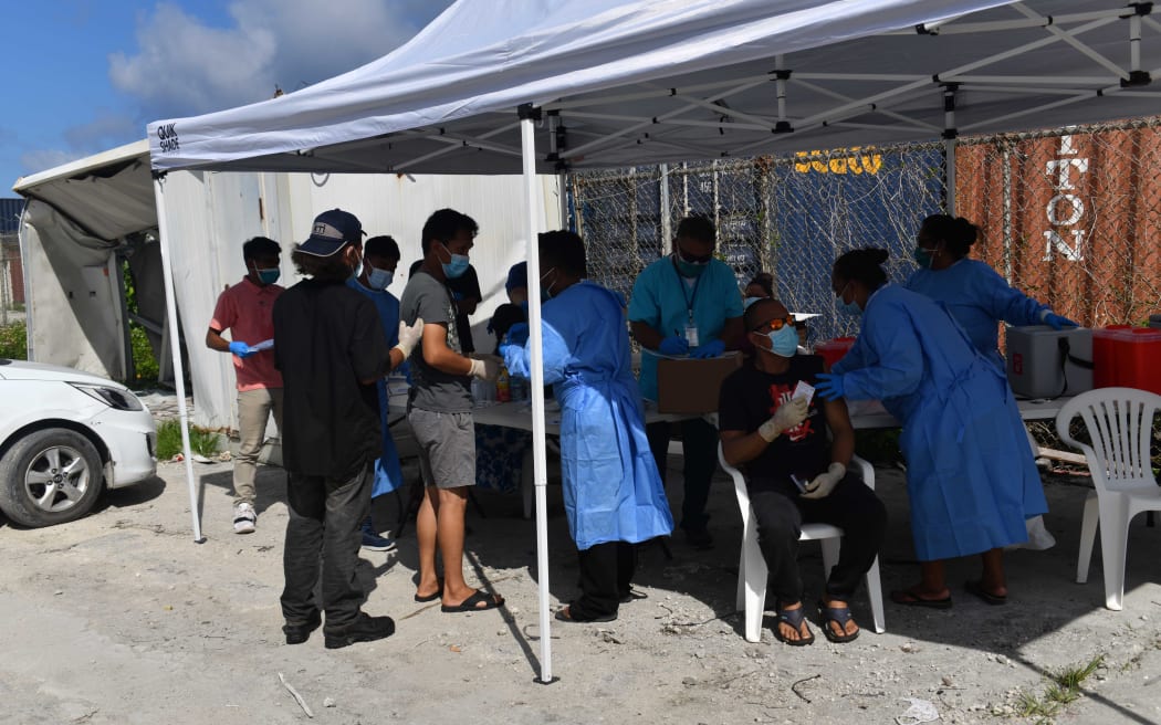 Purse seine fishermen get their Covid shots at the main commercial dock in Majuro June 9. The Marshall Islands vaccine program for fishermen is continuing for more vessels as they arrive in port Majuro to offload their catches of tuna