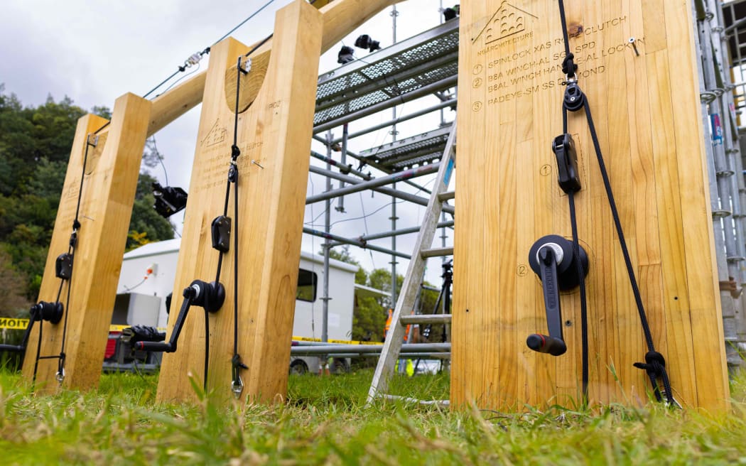 Endangered Māori construction techniques have been proven to be able to withstand major earthquakes which will be used to rebuild an historic Bay of Plenty wharenui.

Close-up of the grinders used to create tension on the timber structure.