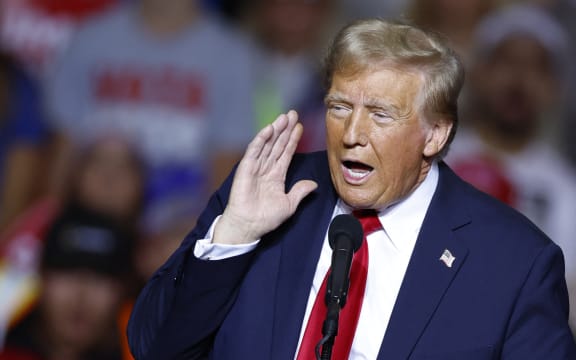 Former US President and Republican presidential candidate Donald Trump gestures as he speaks at a campaign rally at the Fiserv Forum in Milwaukee, Wisconsin, November 1, 2024. (Photo by KAMIL KRZACZYNSKI / AFP)