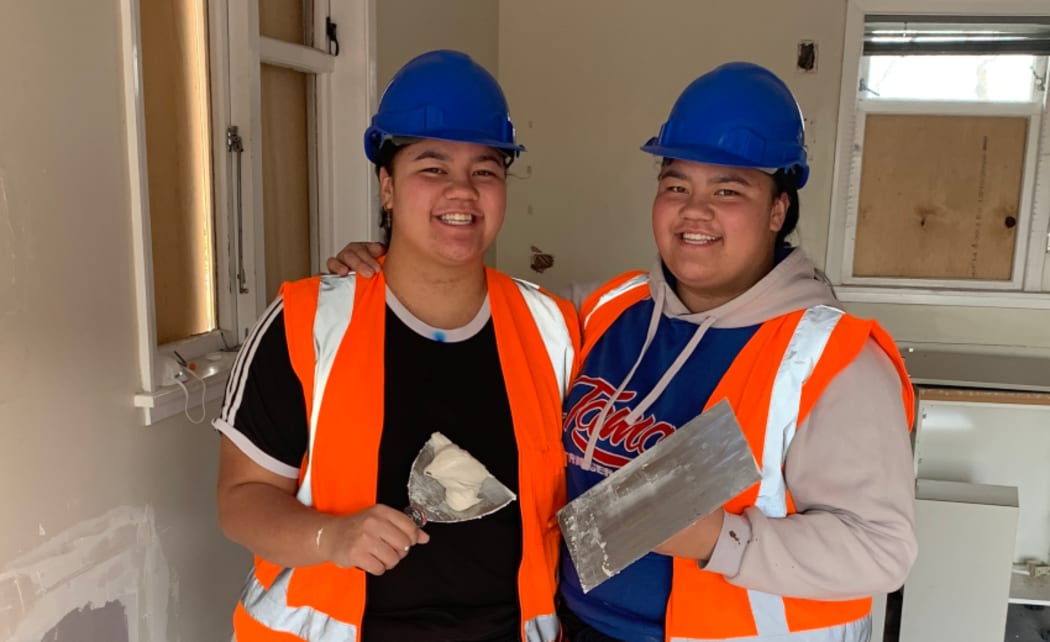 Twin sisters Shonte and Trenneyce Tou at the Ara house project building site.