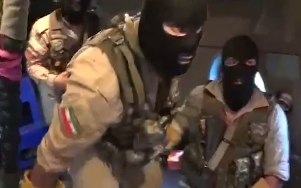 This image grab taken from a video provided by Iran's Revolutionary Guard official website via SEPAH News on July 20, 2019, allegedly shows Revolutionary Guard Corps preparing to board the British-flagged tanker Stena Impero in the Strait of Hormuz.
