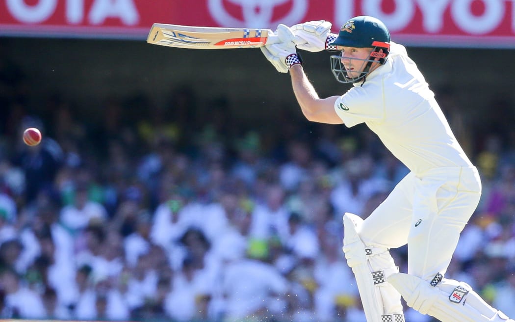 Shaun Marsh drives on the up to cover.