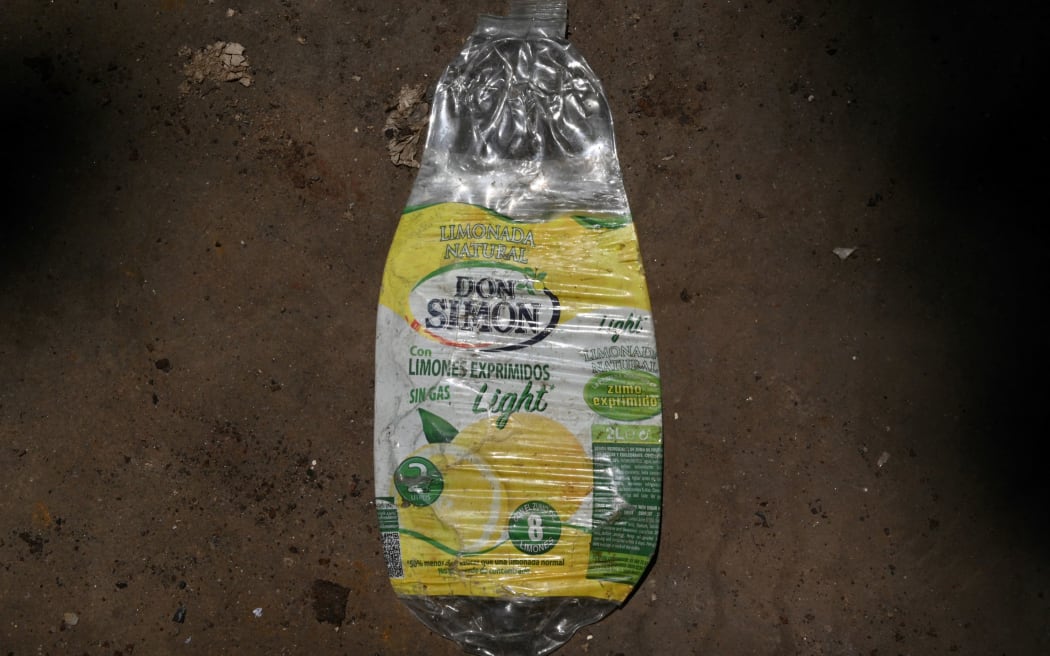This picture taken on March 8, 2019 shows a foreign plastic product from Spain at an abandoned factory in Jenjarom, district of Kuala Langat, outside Kuala Lumpur. -