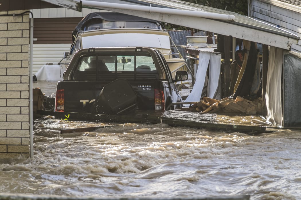 A flooded garage on College Road, opposite the stopbank wall on the river Rangataiki that breached and flooded the majority of the town causing the evacuation of 1600 residents.  Thursday 6 April 2017