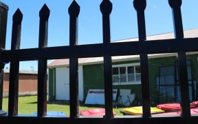 In a desperate bid to flee his attacker, the victim drove his car through a large fence and into a building at Nelson's Founders Heritage Park.