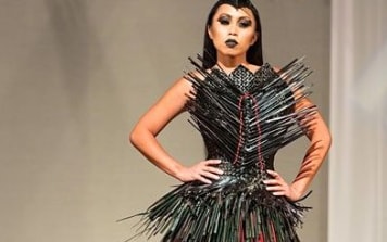 Shona Tawhiao's flaxwork outfit on the catwalk at MaMo in Honolulu, Hawaii.