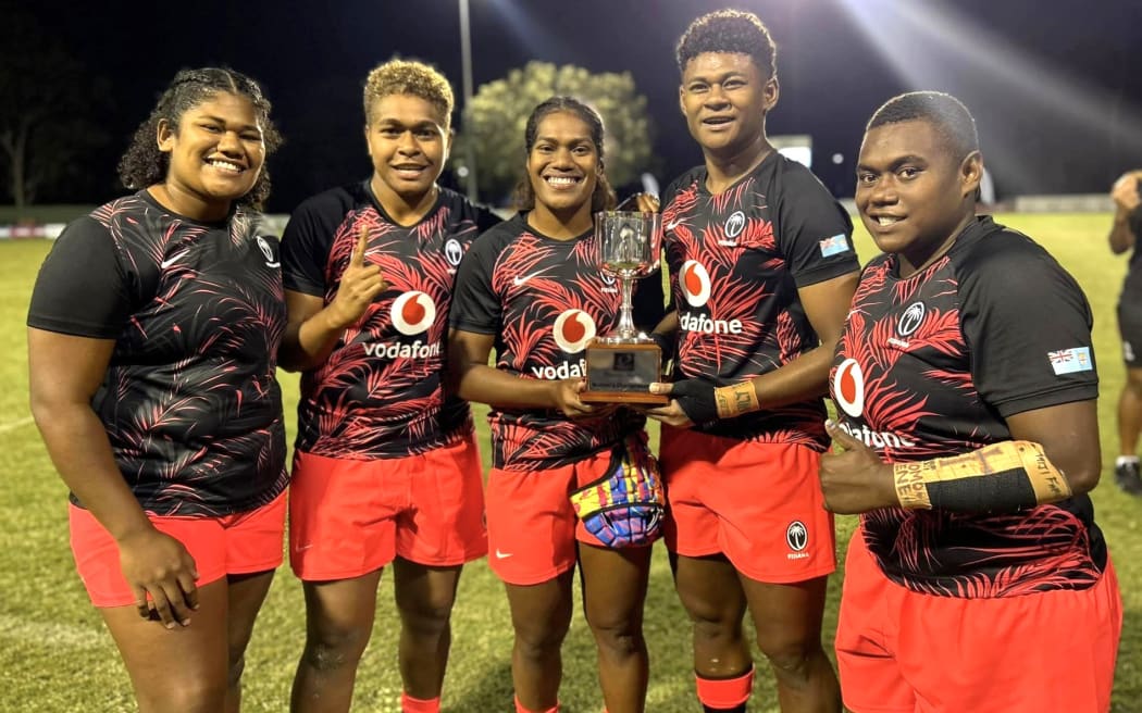 Members of the Fijiana women's rugby team celebrating their win over Samoa in Brisbane on Sunday.