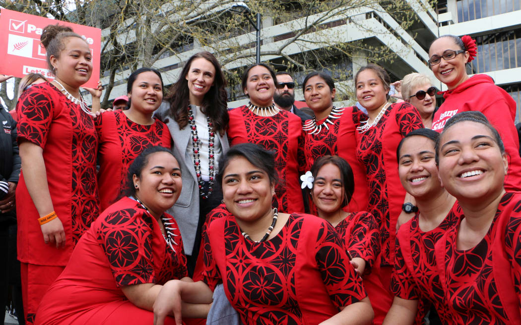 Labour leader Jacinda Ardern with Pasifika dancers at the Otara market today.