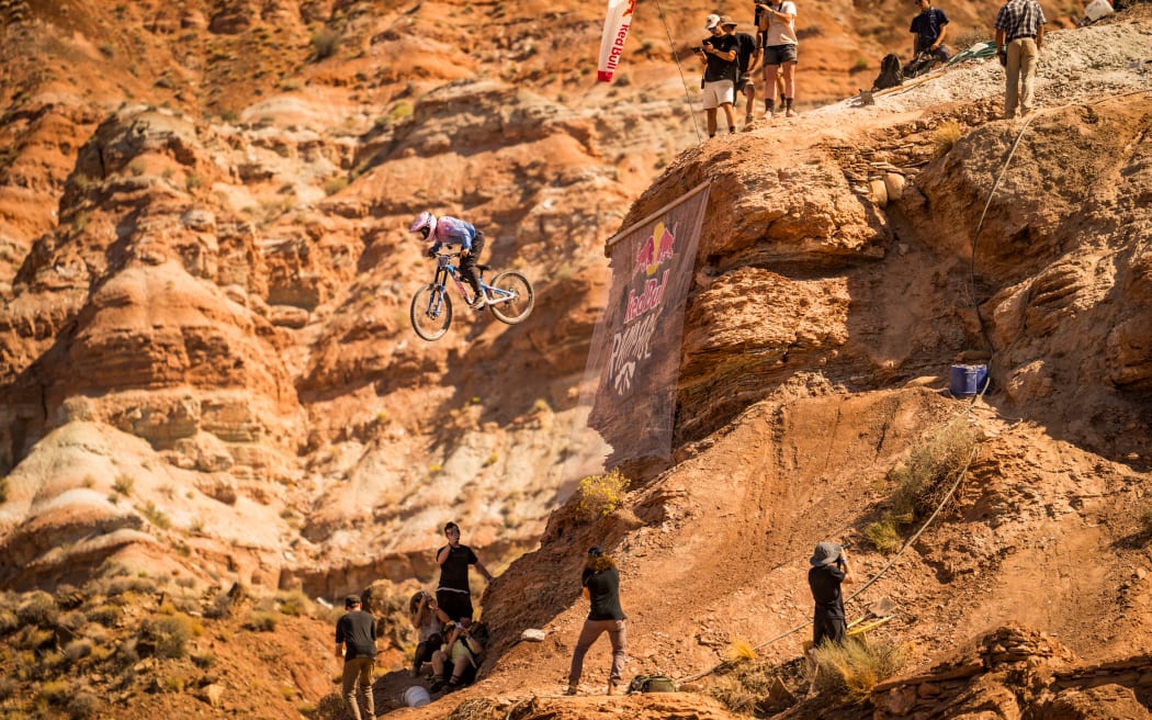 Robin Goomes of New Zealand rides the course during day 3 practice at Red Bull Rampage in Virgin, Utah.
