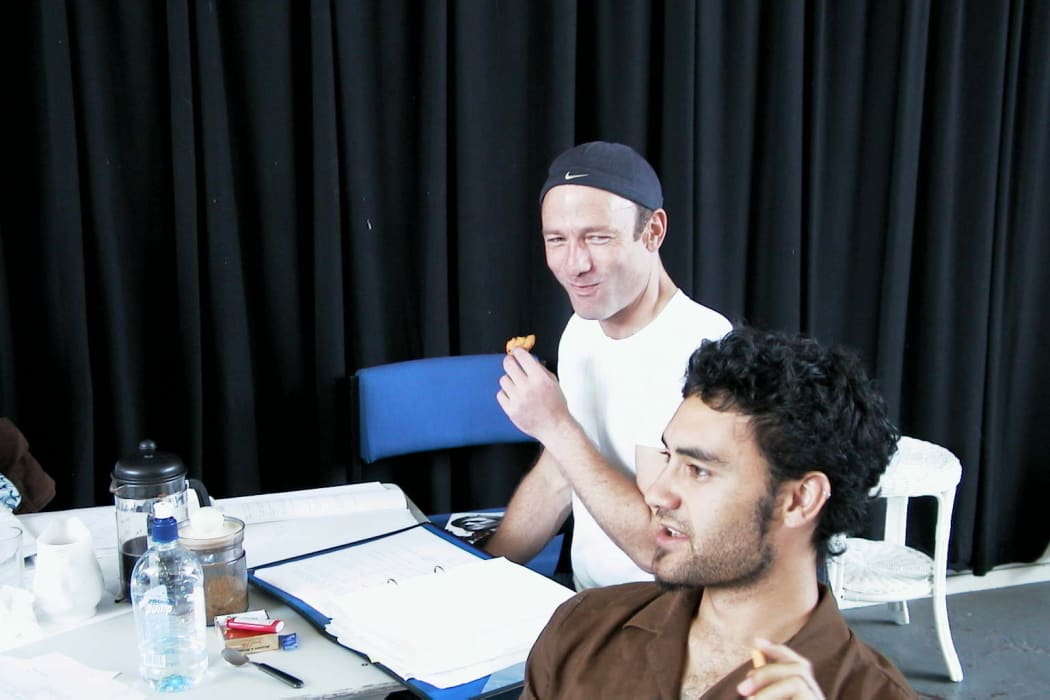 Simon Prast shares a laugh during a rehearsal with Taika Waititi