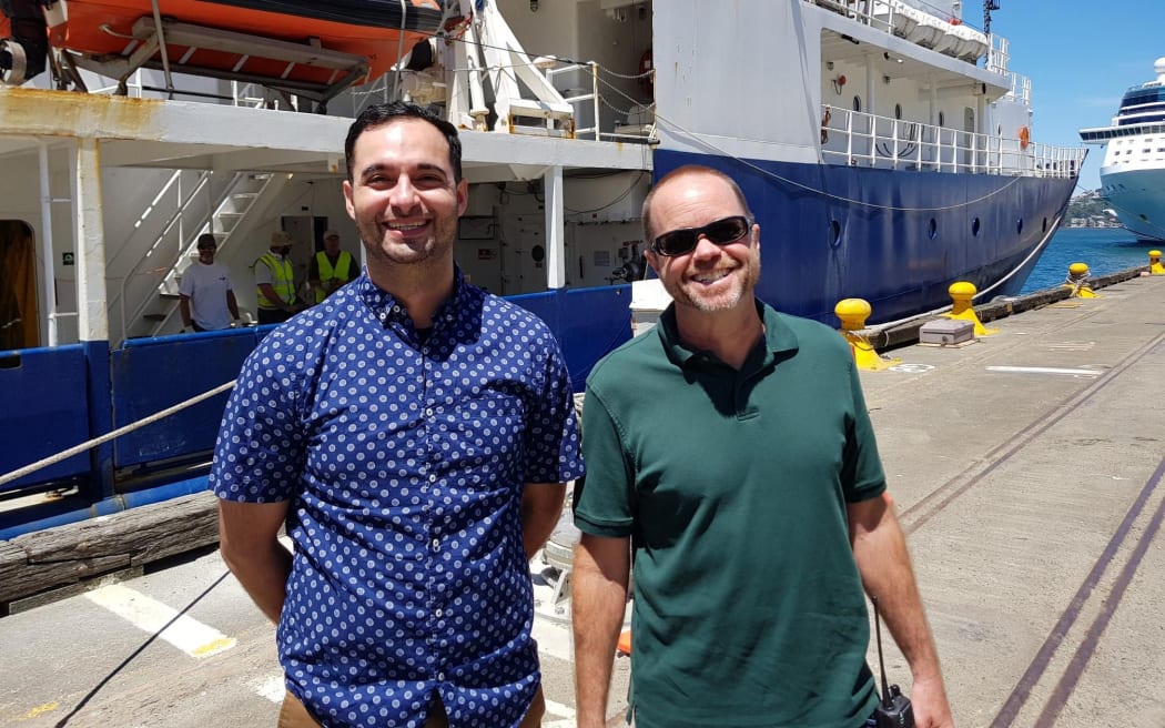 Dr Samer Naif, left, with the captain of  the US research ship Roger Revelle.