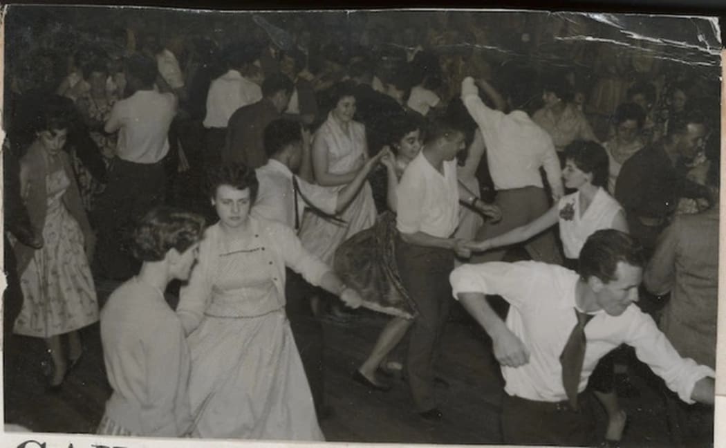 Young men and women rock and roll dancing. Clauson, Lou, 1928-2013:Photographs of singers and other entertainers. Ref: PA1-f-192-42-2. Alexander Turnbull Library, Wellington, New Zealand. /records/23179839
