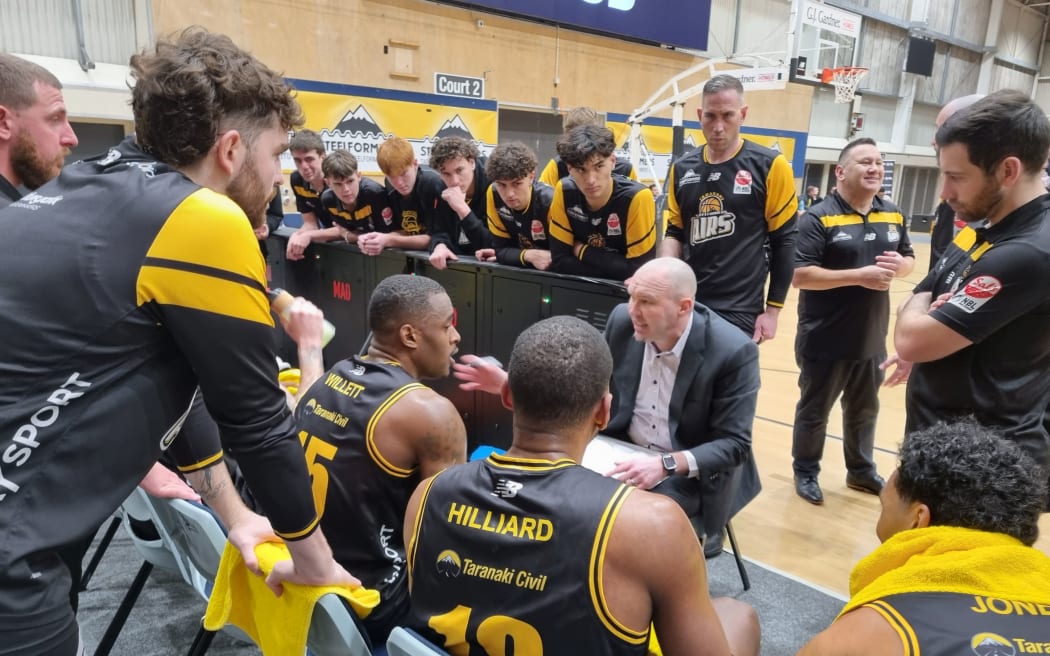 Taranaki Mountain Airs coach Trent Adam speaks to his players