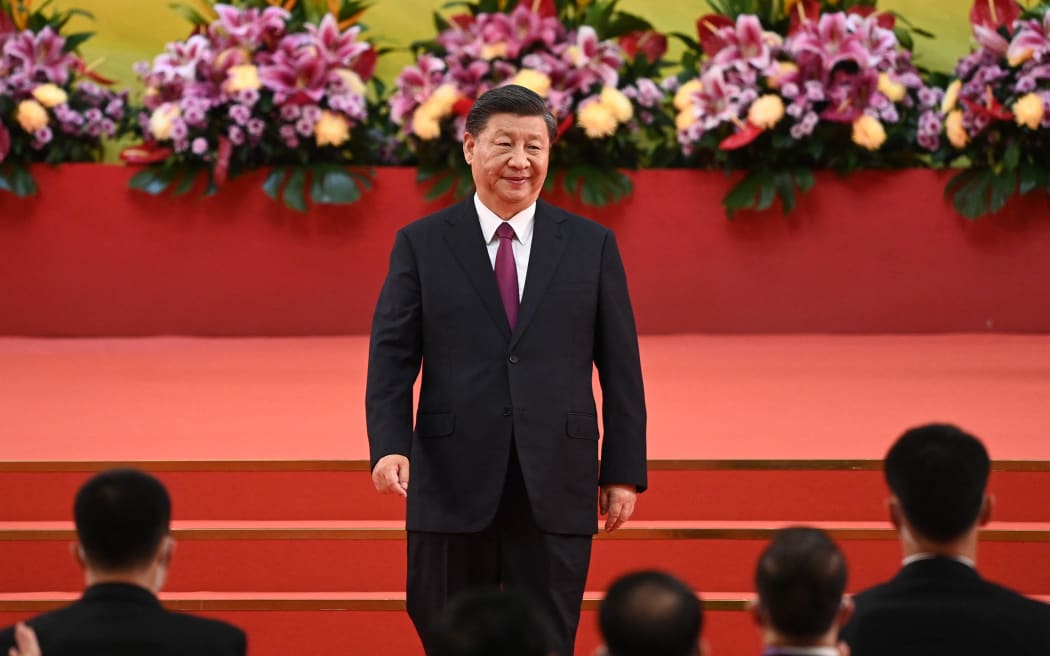 China's President Xi Jinping leaves the podium following his speech after a ceremony to inaugurate the city's new leader and government in Hong Kong on July 1, 2022, on the 25th anniversary of the city's handover from Britain to China.