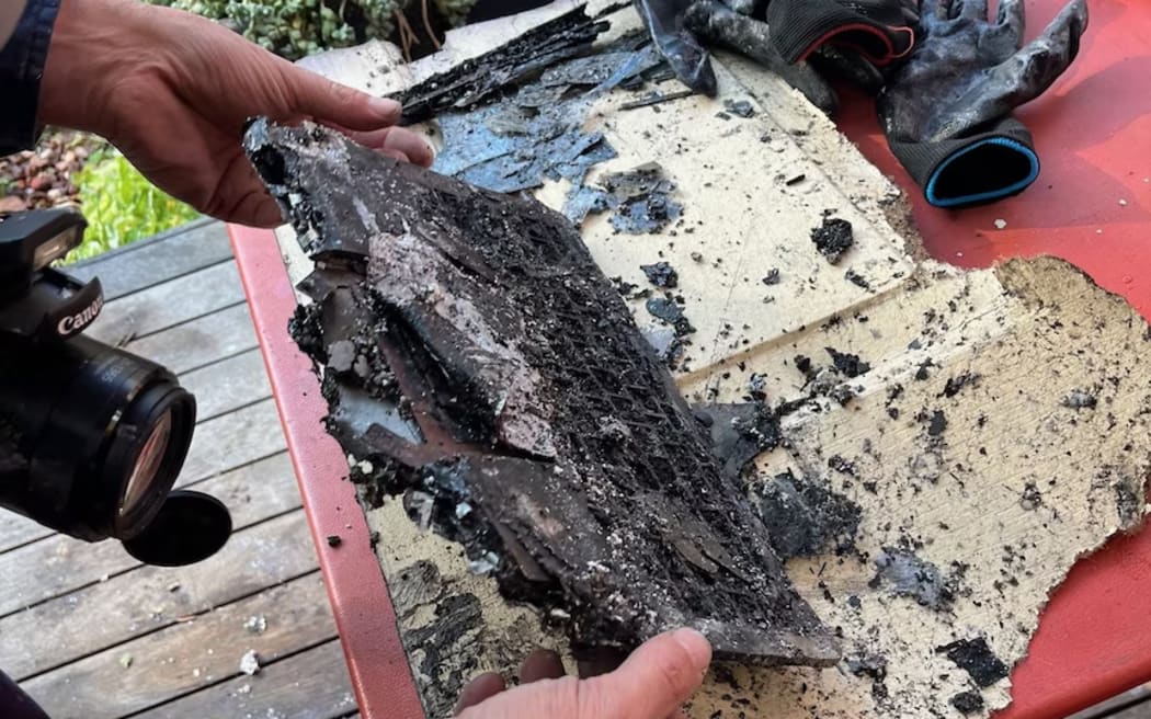The remains of the laptop after a fire ripped through Ms Robinson's property. (Supplied: FRV)