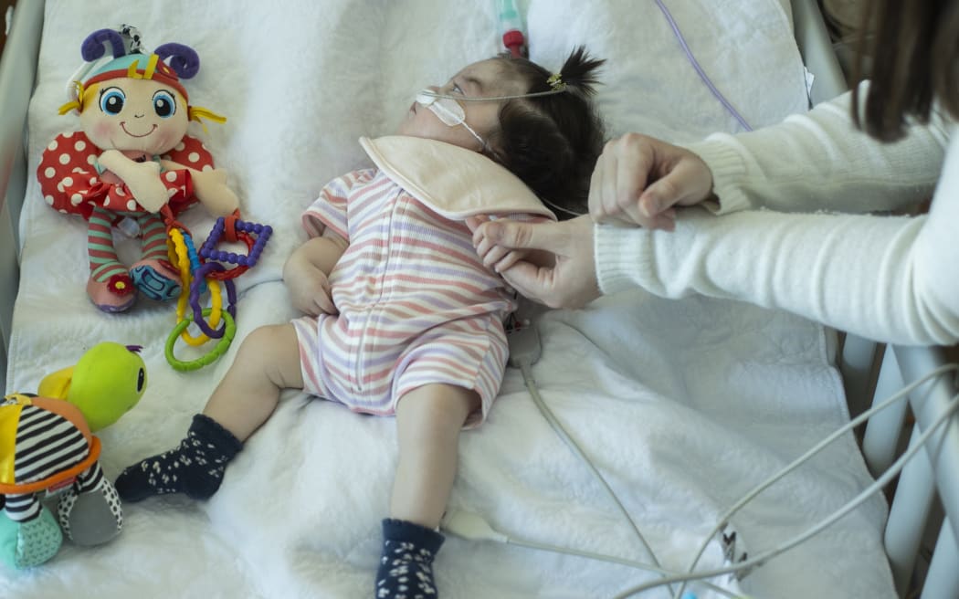 Warner said Luca liked people to be close and always smiled at nurses when they talked to her.
